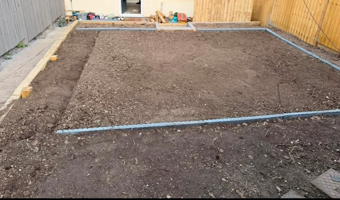 Before: garden dug over and levelled, bare soil